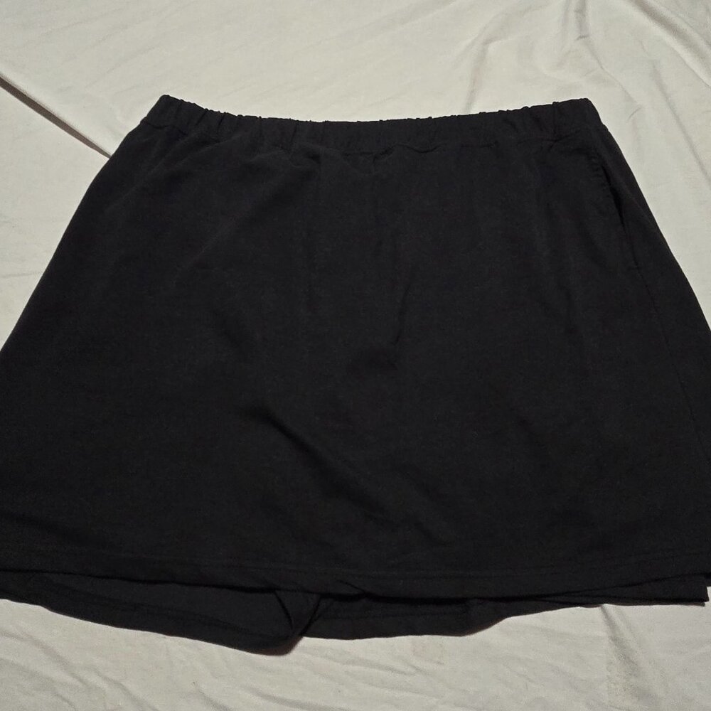 Woman Within Black Skort